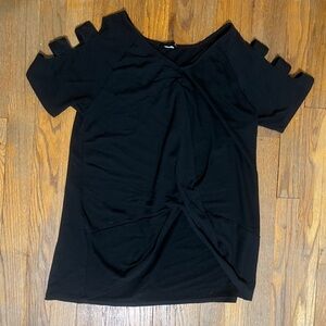 A black, sleeve-slit shirt